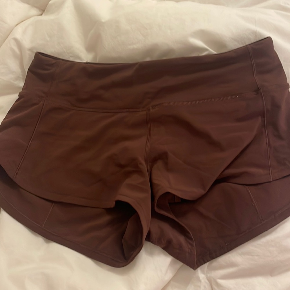 size 4 2.5” inseam brown lululemon speed ups